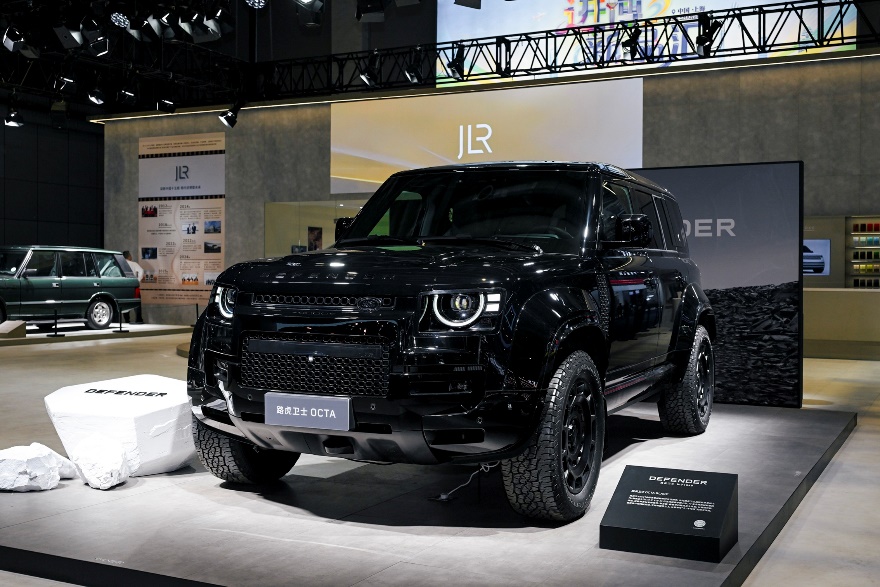 A black suv on displayDescription automatically generated